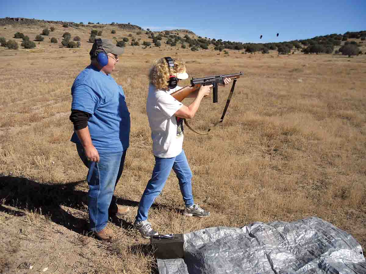 This photo shows Wolfe Publishing’s Becky Pinkley shooting an M1 Thompson Submachine Gun.